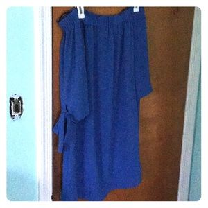 This is A light blue shoulder-less dress